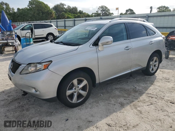 2010 Lexus RX 350 with VIN 2T2BK1BA7AC001406, listed as a Copart auction lot 63128955 with 220,634 mi miles and Salvage title. Bid and sale history available at DreamBid. Image 1.