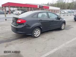 2011 Ford Fiesta SE with VIN 3FADP4BJ5BM221349, listed as a IAAI auction lot 41948737 with 216,540 mi miles. Bid and sale history available at carsss.com. Image 4.