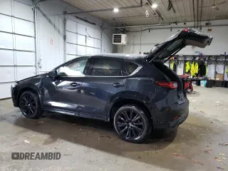 2022 Mazda CX-5 2.5 Turbo with VIN JM3KFBAY8N0648384, listed as a Copart auction lot 79225814 with 21,313 mi miles and Salvage Title. Bid and sale history available at carsss.com. Image 2.