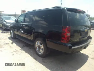 2013 Chevrolet Suburban LT with VIN 1GNSCJE05DR142688, listed as a IAAI auction lot 42214548 with 236,464 mi miles and . Bid and sale history available at DreamBid. Image 3.