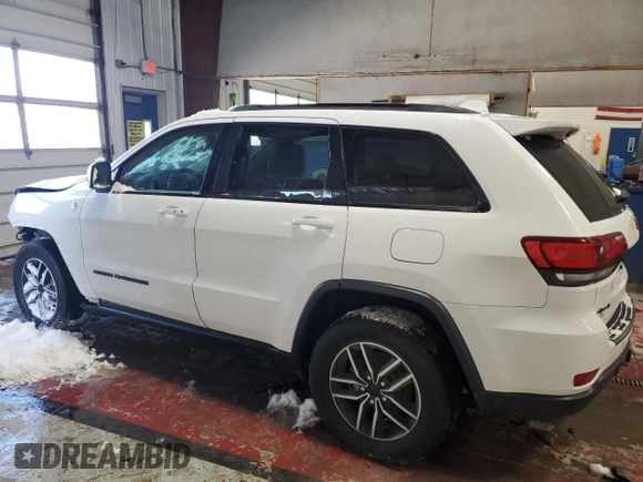 2020 Jeep Grand Cherokee Trailhawk with VIN 1C4RJFLT3LC247609, listed as a Copart auction lot 84491864 with 68,957 mi miles and Salvage title. Bid and sale history available at DreamBid. Image 2.
