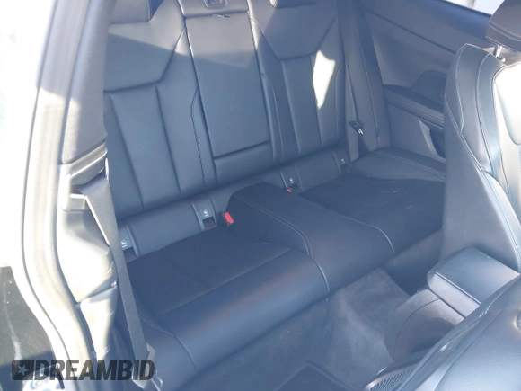 2022 BMW 4 Series 430i xDrive with VIN WBA73AP00NCJ16822, listed as a IAAI auction lot 41329235 with 30,570 mi miles and . Bid and sale history available at DreamBid. Image 8.