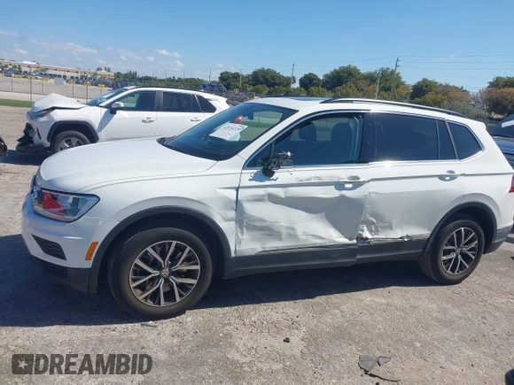 2018 Volkswagen Tiguan SEL with VIN 3VV3B7AX8JM192926, listed as a IAAI auction lot 42034229 with 16,656 mi miles and . Bid and sale history available at DreamBid. Image 14.