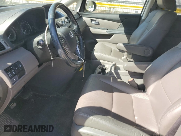 2016 Honda Odyssey EX-L with VIN 5FNRL5H69GB003379, listed as a Copart auction lot 48932295 with 144,904 mi miles and Salvage Title. Bid and sale history available at DreamBid. Image 7.