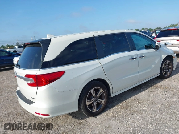 2019 Honda Odyssey Touring with VIN 5FNRL6H81KB068064, listed as a IAAI auction lot 41998072 with 83,280 mi miles. Bid and sale history available at carsss.com. Image 4.