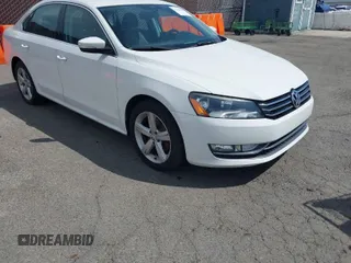 2015 Volkswagen Passat 1.8T Limited Edition with VIN 1VWAT7A3XFC094583, listed as a IAAI auction lot 41922797 with 103,572 mi miles. Bid and sale history available at carsss.com. Image 1.
