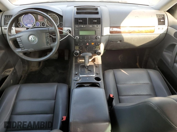 2010 Volkswagen Touareg VR6 with VIN WVGBF7A9XAD001790, listed as a Copart auction lot 70806534 with 90,103 mi miles and Salvage Title. Bid and sale history available at DreamBid. Image 8.