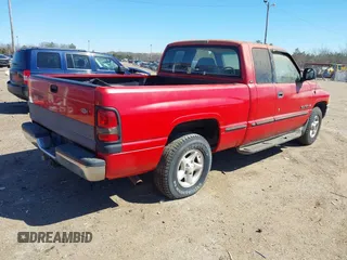 1999 Dodge 1500 z VIN 3B7HC13Y1XM517526, wystawiony jako IAAI lot #41746242 z przebiegiem 116 048 mil mil oraz . Historia ofert i sprzedaży dostępna na DreamBid. Obrazek 4.