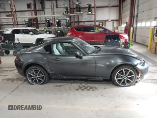 2021 Mazda MX-5 Miata Grand Touring with VIN JM1NDAM73M0451484, listed as a IAAI auction lot 41485044 with 11,328 mi miles and . Bid and sale history available at DreamBid. Image 13.