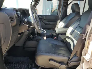 2017 Jeep Wrangler Unlimited Sahara with VIN 1C4BJWEG0HL727423, listed as a Copart auction lot 56719285 with 62,965 mi miles and Salvage title. Bid and sale history available at DreamBid. Image 7.