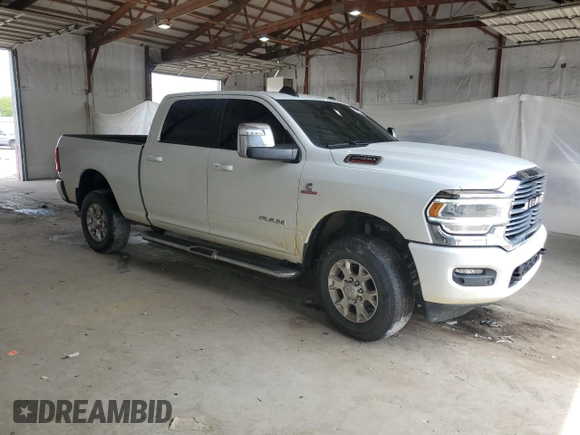 2023 Ram 2500 Laramie with VIN 3C6UR5FL2PG632162, listed as a Copart auction lot 56220575 with 59,902 mi miles and Salvage title. Bid and sale history available at DreamBid. Image 4.