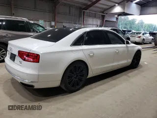 2014 Audi A8 4.0T with VIN WAUR2AFD1EN005555, listed as a Copart auction lot 55664075 with 170,188 mi miles and Salvage title. Bid and sale history available at DreamBid. Image 3.
