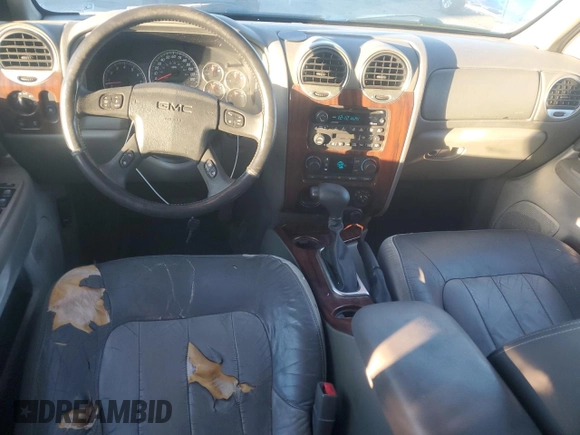 2003 GMC Envoy SLE with VIN 1GKDS13S932170188, listed as a Copart auction lot 82027964 with 266,978 mi miles and Clean Title. Bid and sale history available at carsss.com. Image 8.