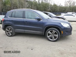 2011 Volkswagen Tiguan SE with VIN WVGBV7AX8BW523969, listed as a Copart auction lot 52463575 with 142,209 mi miles and Clean Title. Bid and sale history available at DreamBid. Image 4.