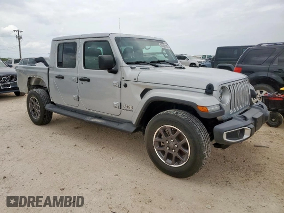 2022 Jeep Gladiator High Altitude with VIN 1C6HJTFGXNL163998, listed as a Copart auction lot 56490755 with 52,474 mi miles and Salvage title. Bid and sale history available at DreamBid. Image 4.