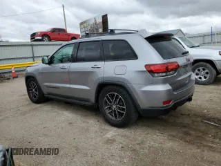 2018 Jeep Grand Cherokee Trailhawk with VIN 1C4RJFLG8JC164774, listed as a Copart auction lot 51699845 with 104,467 mi miles and Salvage title. Bid and sale history available at DreamBid. Image 2.