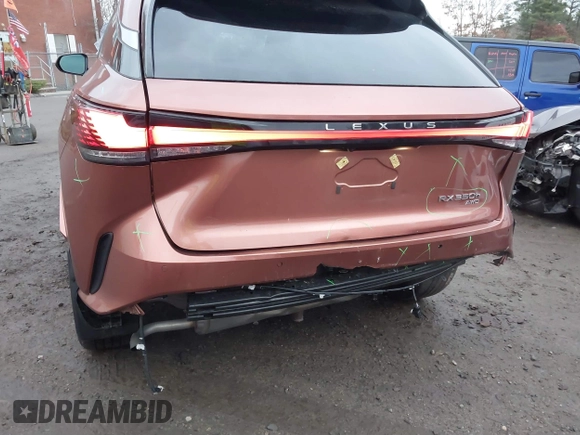 2023 Lexus RX 350h with VIN 2T2BBMCAXPC018936, listed as a IAAI auction lot 41027968 with 20,669 mi miles and . Bid and sale history available at DreamBid. Image 6.