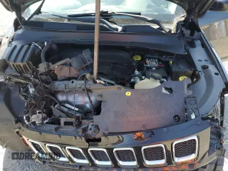 2018 Jeep Compass Sport with VIN 3C4NJCABXJT105430, listed as a Copart auction lot 59237575 with 104,600 mi miles and Salvage title. Bid and sale history available at DreamBid. Image 12.