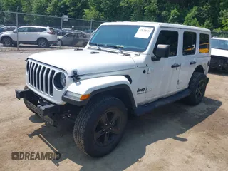 2021 Jeep Wrangler Unlimited Sahara with VIN 1C4HJXEN1MW618508, listed as a IAAI auction lot 42639515 with 39,747 mi miles and . Bid and sale history available at DreamBid. Image 2.