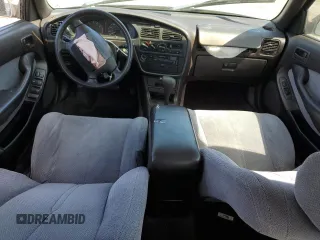 1994 Toyota Camry LE z VIN JT2GK12E6R0055565, wystawiony jako Copart lot #54031255 z przebiegiem 240 841 mil mil oraz Szkoda całkowita • Salvage title. Historia ofert i sprzedaży dostępna na DreamBid. Obrazek 8.