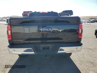 2021 Ford F-150 XL with VIN 1FTMF1E50MKD44349, listed as a Copart auction lot 76947214 with 34,592 mi miles and Salvage title. Bid and sale history available at DreamBid. Image 6.