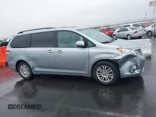2011 Toyota Sienna XLE AAS with VIN 5TDYK3DC5BS111467, listed as a IAAI auction lot 41560895 with 126,917 mi miles. Bid and sale history available at carsss.com. Image 13.