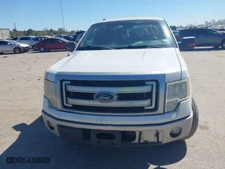 2013 Ford F-150 XL with VIN 1FTFW1CF7DFA66868, listed as a IAAI auction lot 41784163 with 218,303 mi miles. Bid and sale history available at carsss.com. Image 12.