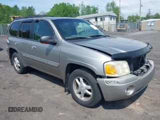 2002 GMC Envoy SLT z VIN 1GKDT13S122114094, wystawiony jako IAAI lot #42226483 z przebiegiem 213 808 mil mil oraz . Historia ofert i sprzedaży dostępna na DreamBid. Obrazek 1.