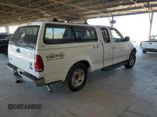 1998 Ford F-150 с VIN 1FTRX18L0WKA53124, выставлен на аукционе Copart как лот 66466945 с пробегом 252 908 миль миль и Чистый • Clean title. История ставок и продаж доступна на DreamBid. Изображение 3.