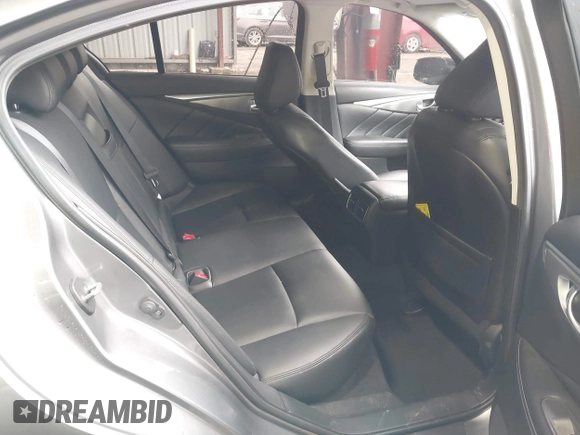 2015 Infiniti Q50 Premium z VIN JN1BV7ARXFM411040, wystawiony jako IAAI lot #41706295 z przebiegiem 97 297 mil mil oraz . Historia ofert i sprzedaży dostępna na DreamBid. Obrazek 8.