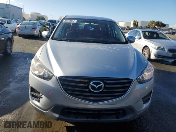 2016 Mazda CX-5 Sport with VIN JM3KE2BEXG0904597, listed as a Copart auction lot 86293834 with 63,343 mi miles and Salvage Title. Bid and sale history available at carsss.com. Image 5.