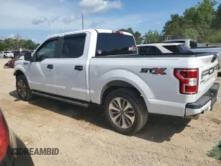 2018 Ford F-150 XL with VIN 1FTEW1CPXJKF27567, listed as a Copart auction lot 63034034 with 125,508 mi miles and Salvage title. Bid and sale history available at DreamBid. Image 2.
