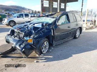 2007 GMC Envoy Denali with VIN 1GKET63M072227691, listed as a IAAI auction lot 41612371 with 154,001 mi miles. Bid and sale history available at carsss.com. Image 2.