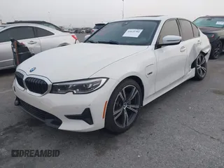 2022 BMW 3 Series 330e with VIN 3MW5P7J04N8C40865, listed as a IAAI auction lot 41635704 with 44,929 mi miles. Bid and sale history available at carsss.com. Image 2.