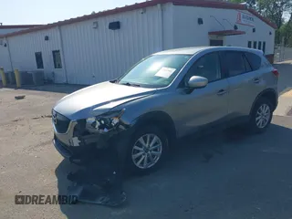 2014 Mazda CX-5 Touring with VIN JM3KE2CY9E0310315, listed as a IAAI auction lot 41943991 with 98,359 mi miles and . Bid and sale history available at carsss.com. Image 6.