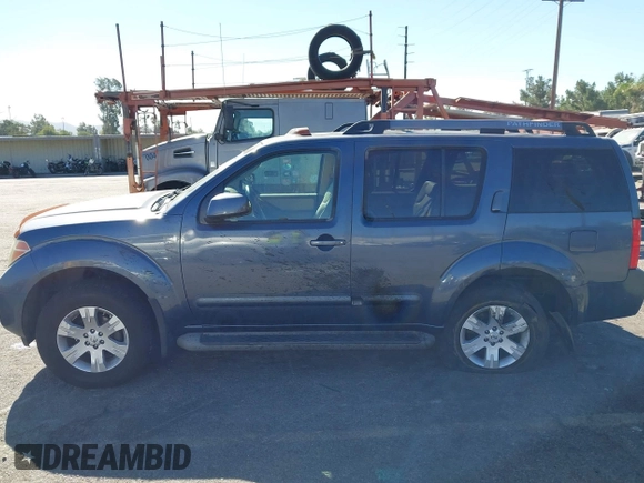 2005 Nissan Pathfinder SE with VIN 5N1AR18U05C741080, listed as a IAAI auction lot 40671277 with 215,693 mi miles. Bid and sale history available at carsss.com. Image 14.