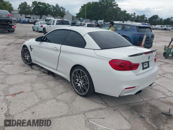 2018 BMW M4 with VIN WBS4Z9C5XJED22650, listed as a IAAI auction lot 42631888 with 41,266 mi miles and . Bid and sale history available at DreamBid. Image 3.