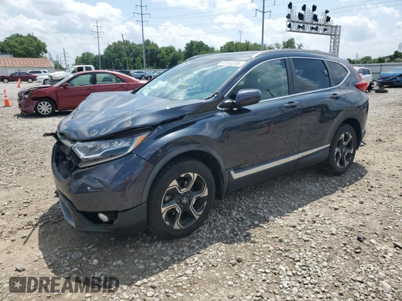 2018 Honda CR-V Touring with VIN 2HKRW2H9XJH605264, listed as a Copart auction lot 61500315 with 106,616 mi miles and Salvage title. Bid and sale history available at DreamBid. Image 1.