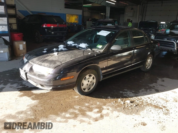 2000 Saturn SL with VIN 1G8ZH5282YZ214070, listed as a IAAI auction lot 41537546 with 94,319 mi miles. Bid and sale history available at carsss.com. Image 2.