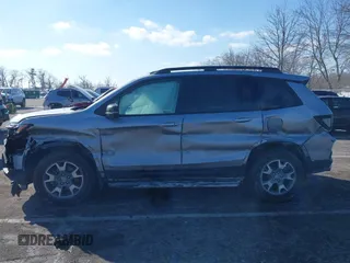 2022 Honda Passport TrailSport with VIN 5FNYF8H61NB000381, listed as a IAAI auction lot 41417954 with 32,753 mi miles and . Bid and sale history available at DreamBid. Image 14.