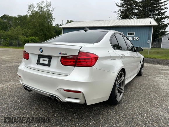 2015 BMW M3 with VIN WBS3C9C57FP803591, listed as a Copart auction lot 62894955 with 183,389 mi miles and Clean title. Bid and sale history available at DreamBid. Image 4.