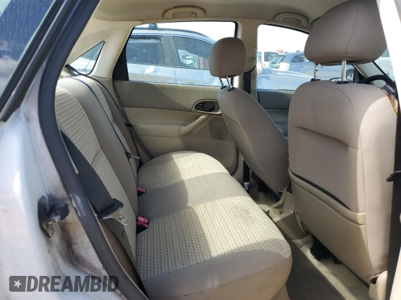 2007 Ford Focus S z VIN 1FAHP34N07W331020, wystawiony jako Copart lot #45483515 z przebiegiem 80 981 mil mil oraz Czysty tytuł • Clean title. Historia ofert i sprzedaży dostępna na DreamBid. Obrazek 10.