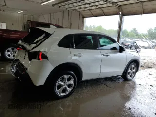 2023 Honda HR-V LX with VIN 3CZRZ2H36PM720315, listed as a Copart auction lot 61372745 with 35,531 mi miles and Salvage title. Bid and sale history available at DreamBid. Image 3.
