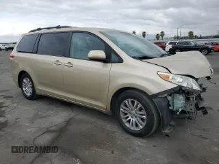 2011 Toyota Sienna XLE AAS with VIN 5TDYK3DC7BS110854, listed as a Copart auction lot 54604135 with 161,612 mi miles and Salvage Title. Bid and sale history available at DreamBid. Image 4.
