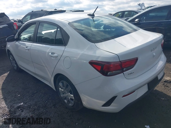 2023 Kia Rio LX z VIN 3KPA24AD6PE539134, wystawiony jako IAAI lot #41519326 z przebiegiem 39 925 mil mil oraz . Historia ofert i sprzedaży dostępna na DreamBid. Obrazek 3.