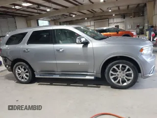 2016 Dodge Durango Citadel Anodized Platinum with VIN 1C4SDJET9GC459090, listed as a IAAI auction lot 41991478 with 115,924 mi miles and . Bid and sale history available at DreamBid. Image 14.
