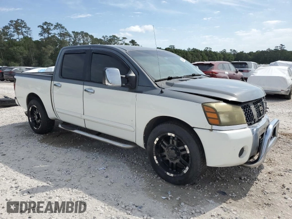 2004 Nissan Titan LE with VIN 1N6AA07A44N580326, listed as a Copart auction lot 53446825 with 236,618 mi miles and Salvage title. Bid and sale history available at DreamBid. Image 4.
