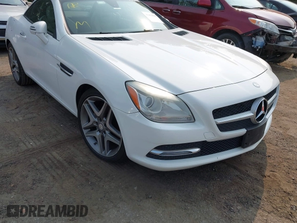 2015 Mercedes-Benz SLK 250 z VIN WDDPK4HA2FF100514, wystawiony jako IAAI lot #42414167 z przebiegiem 120 615 mil mil oraz . Historia ofert i sprzedaży dostępna na DreamBid. Obrazek 6.