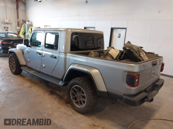 2021 Jeep Gladiator High Altitude with VIN 1C6HJTFG1ML556741, listed as a IAAI auction lot 42240680 with 47,926 mi miles and . Bid and sale history available at DreamBid. Image 3.
