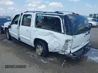 2004 Chevrolet Suburban LT with VIN 1GNEC16Z94J104406, listed as a IAAI auction lot 40114761 with 243,468 mi miles. Bid and sale history available at carsss.com. Image 3.